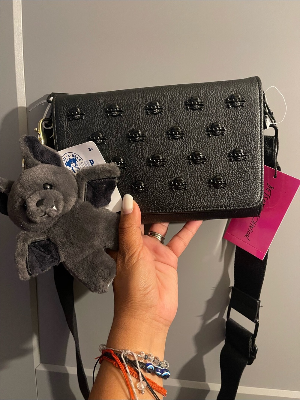 Betsey johnson Black skull crossbody bag with build a bear bat keychain